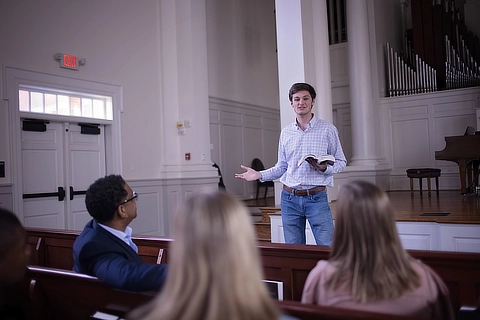 student preaching in Reid Chapel