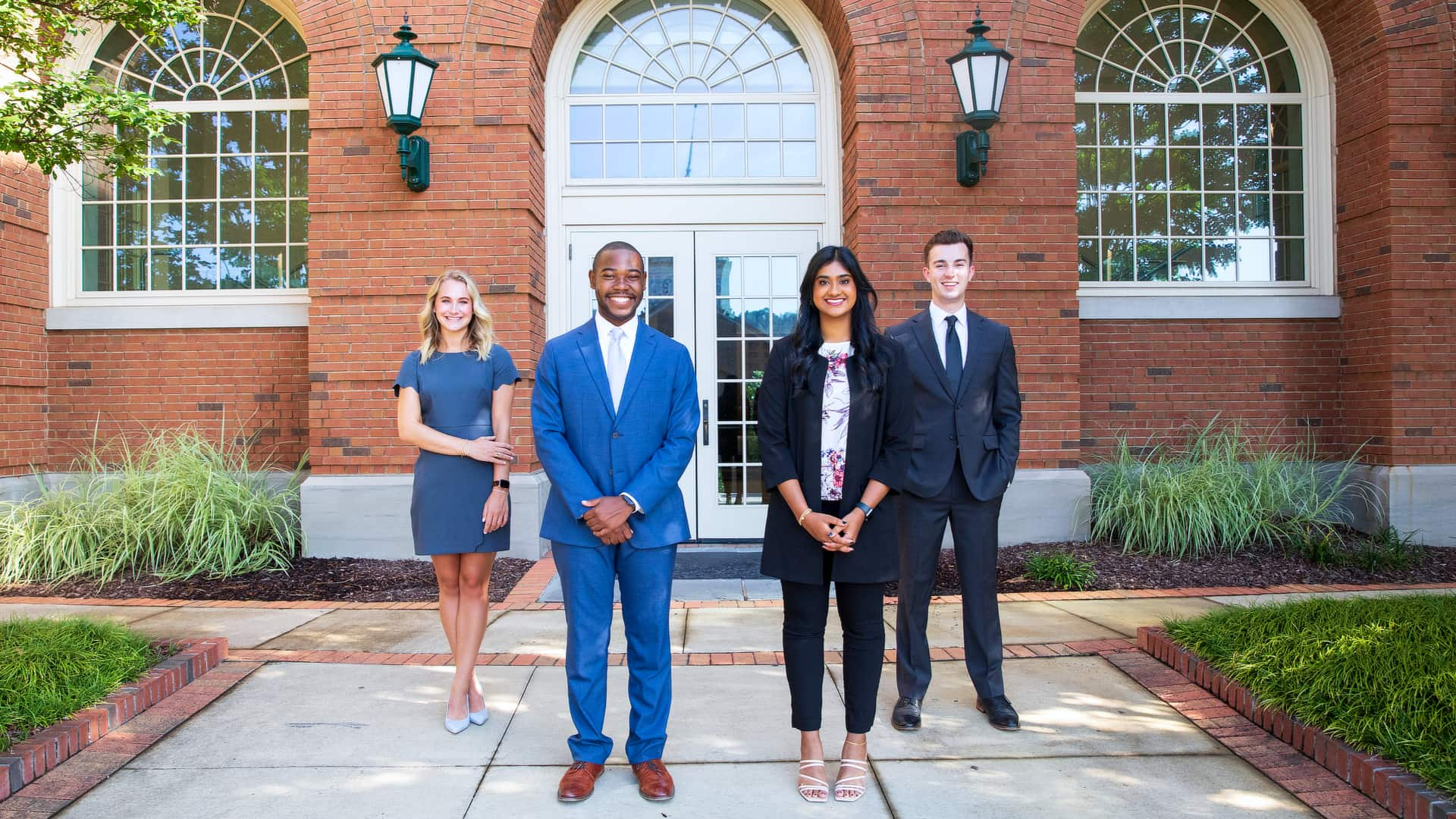 Students in front of Cooney Hall