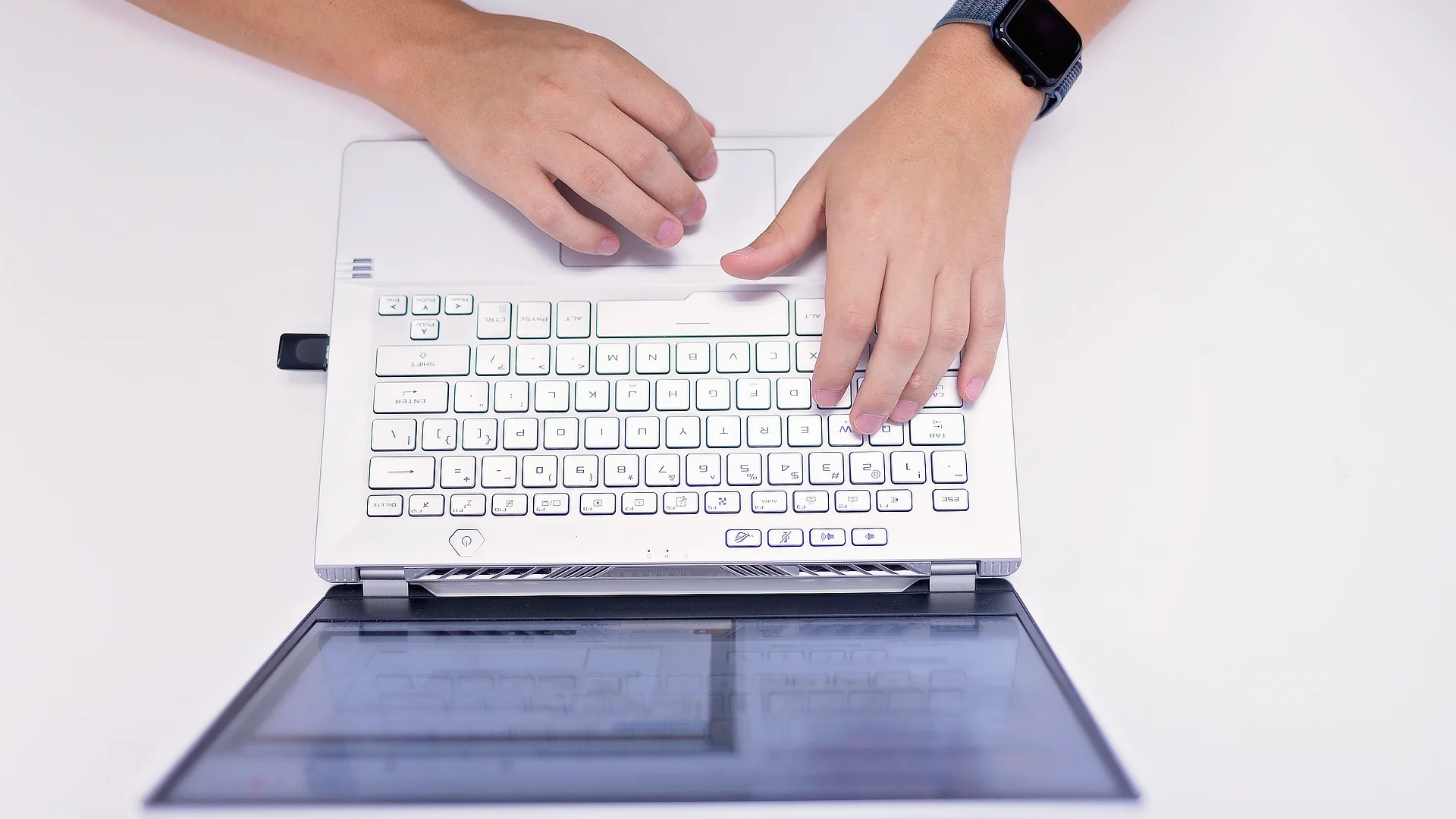 Hands Typing on Keyboard