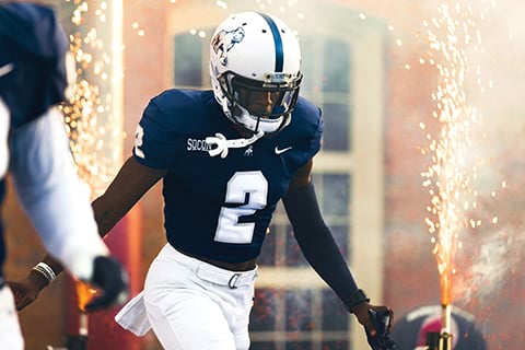 Samford football player celebrating