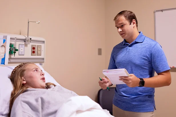 Male Student with Patient